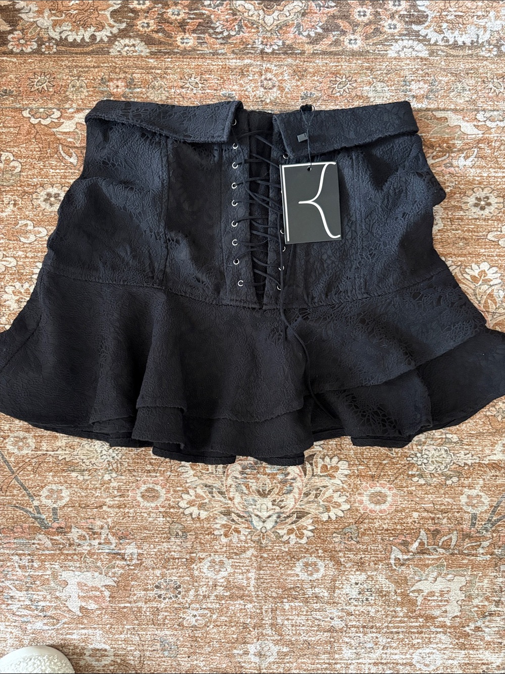 Dance & Marvel Black Lace-Up Ruffled Mini Skirt